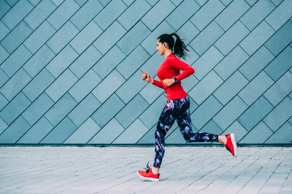 woman-runner-wearing-red-heart-health-month.jpg